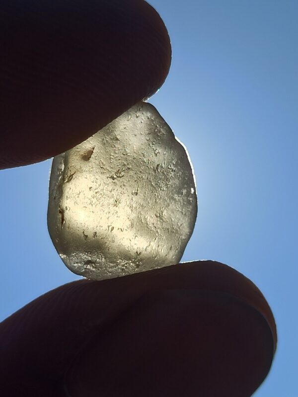 Sinhalite: Rare Rough Stone Unveiled