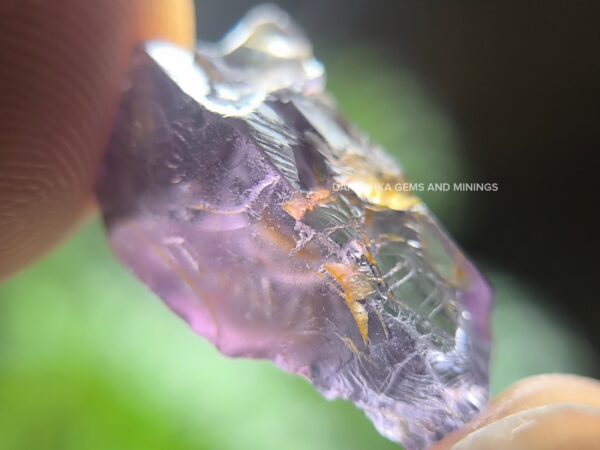 Facet grade purple spinel rough