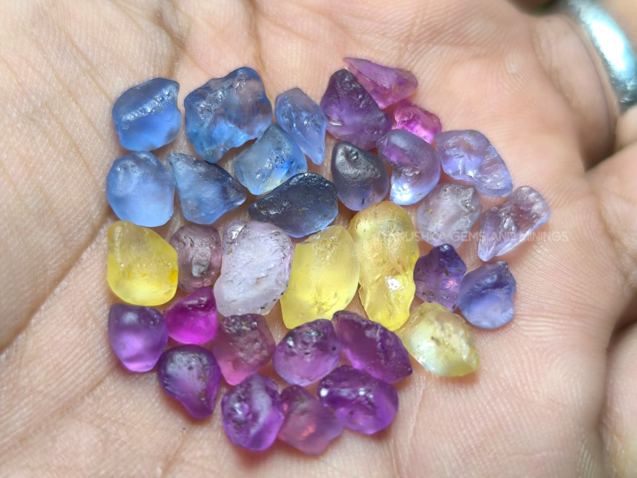 50 ct Ceylon natural unheated sapphire rough parcel with 32 pieces in pink, purple, blue, yellow, violet, lavender, and bi-color sapphire from Sri Lanka