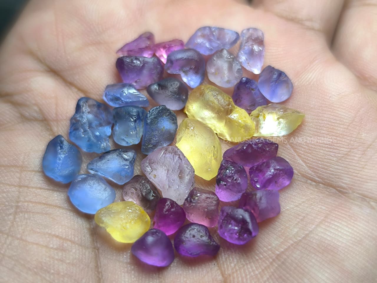 50 ct Ceylon natural unheated sapphire rough parcel with 32 pieces in pink, purple, blue, yellow, violet, lavender, and bi-color sapphire from Sri Lanka