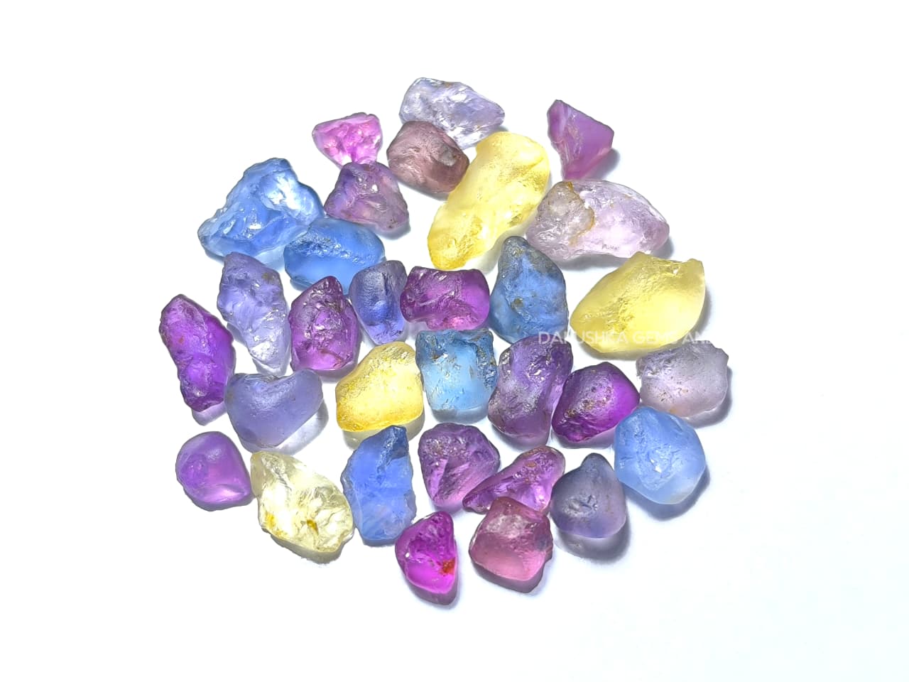 50 ct Ceylon natural unheated sapphire rough parcel with 32 pieces in pink, purple, blue, yellow, violet, lavender, and bi-color sapphire from Sri Lanka