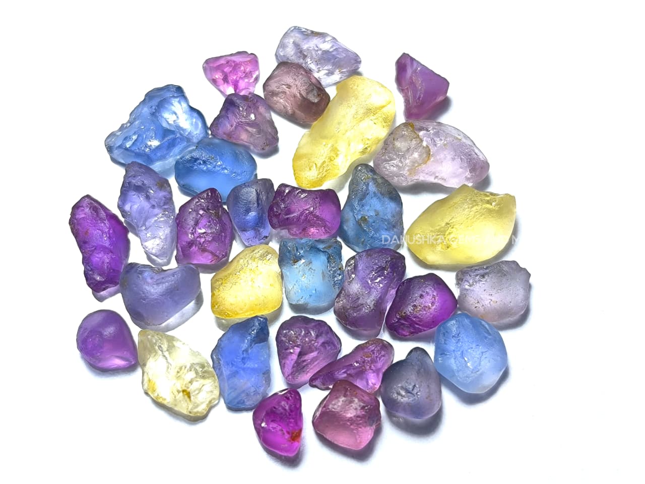 50 ct Ceylon natural unheated sapphire rough parcel with 32 pieces in pink, purple, blue, yellow, violet, lavender, and bi-color sapphire from Sri Lanka