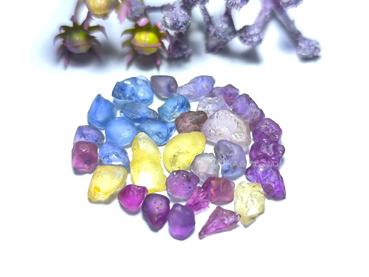 50 ct Ceylon natural unheated sapphire rough parcel with 32 pieces in pink, purple, blue, yellow, violet, lavender, and bi-color sapphire from Sri Lanka