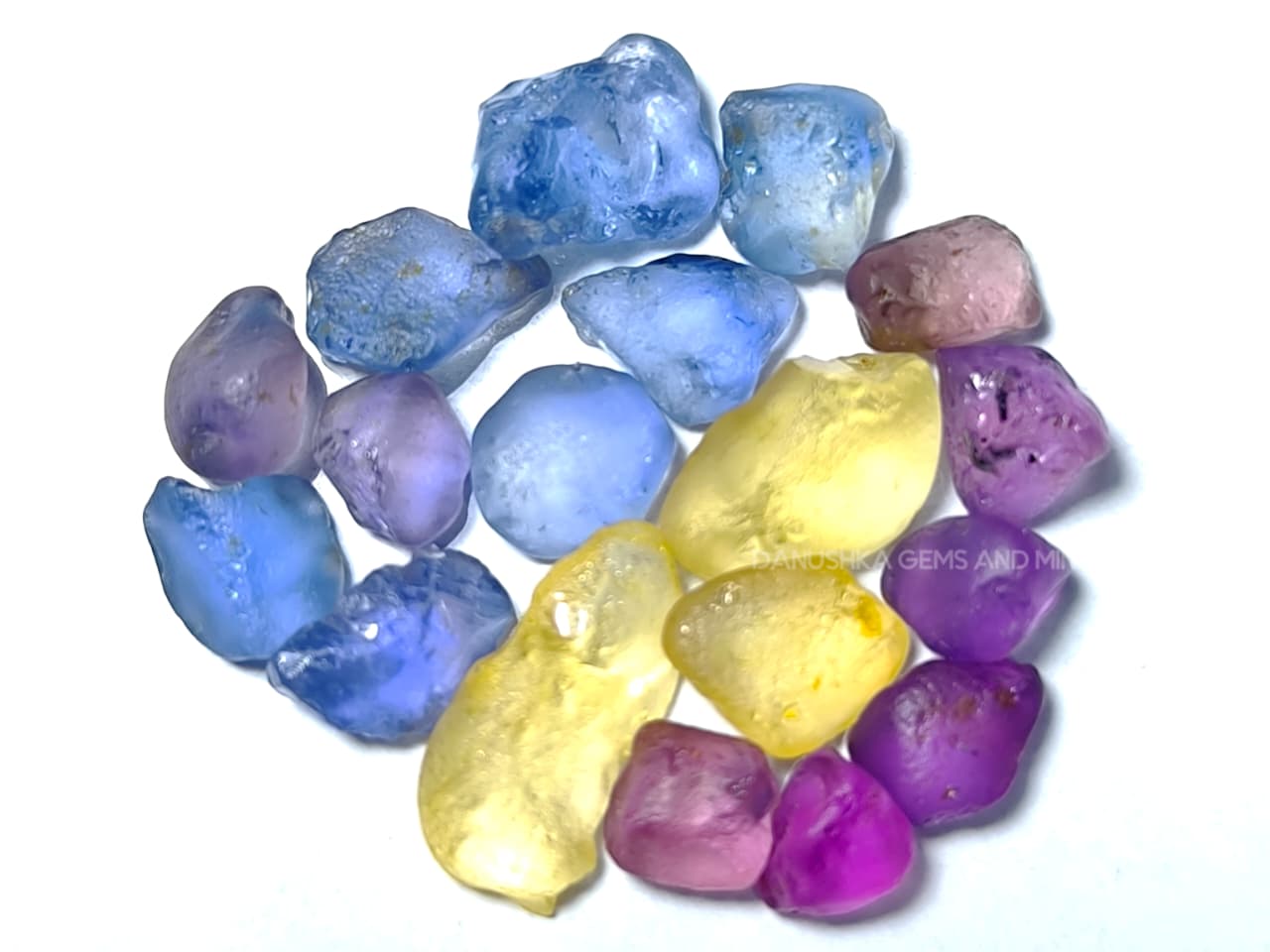 50 ct Ceylon natural unheated sapphire rough parcel with 32 pieces in pink, purple, blue, yellow, violet, lavender, and bi-color sapphire from Sri Lanka