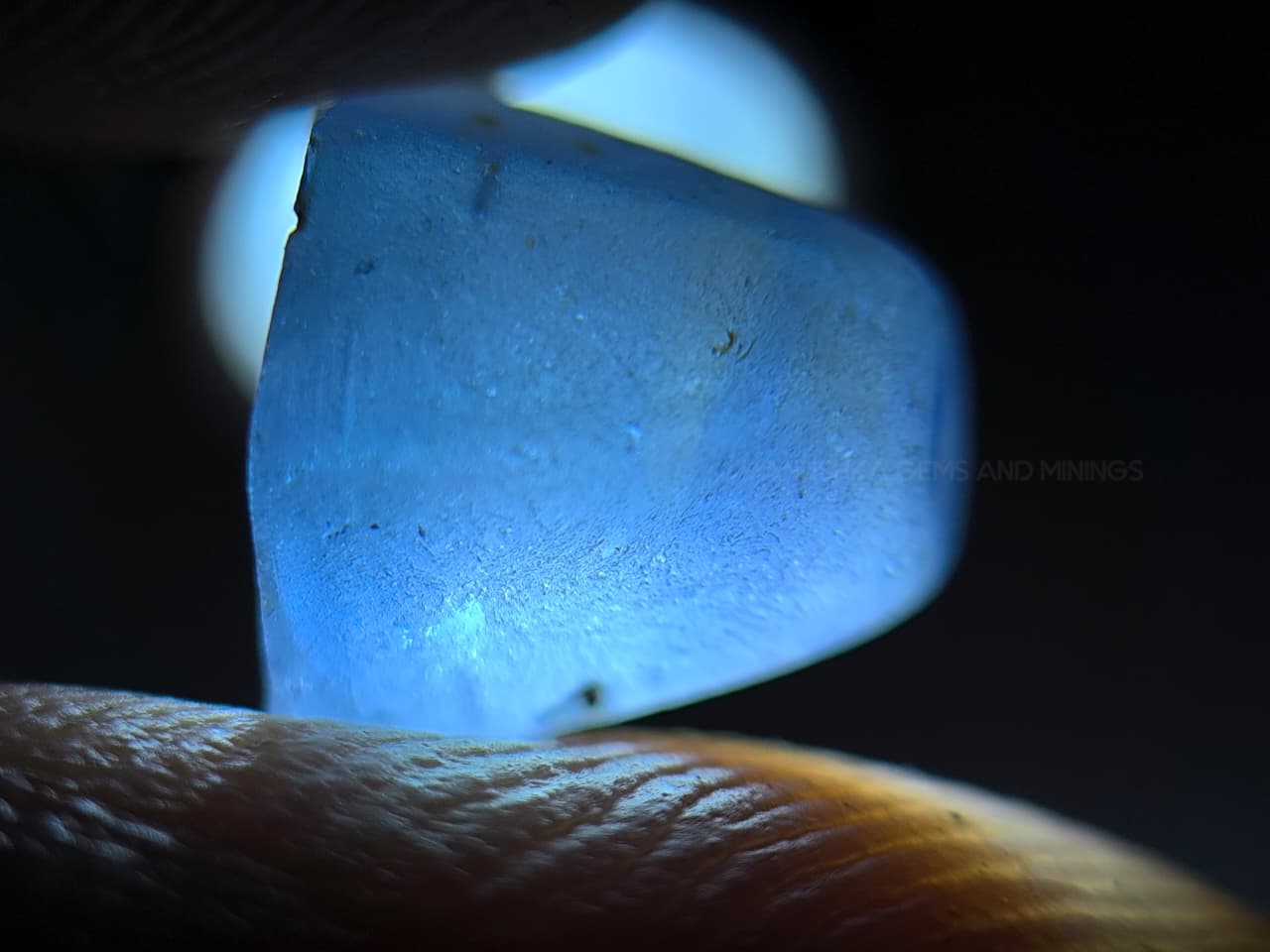 4.50 ct Ceylon Natural Unheated Blue Sapphire rough from Rakwana village around mining in Sri Lanka with visible internal features and cutting potential.