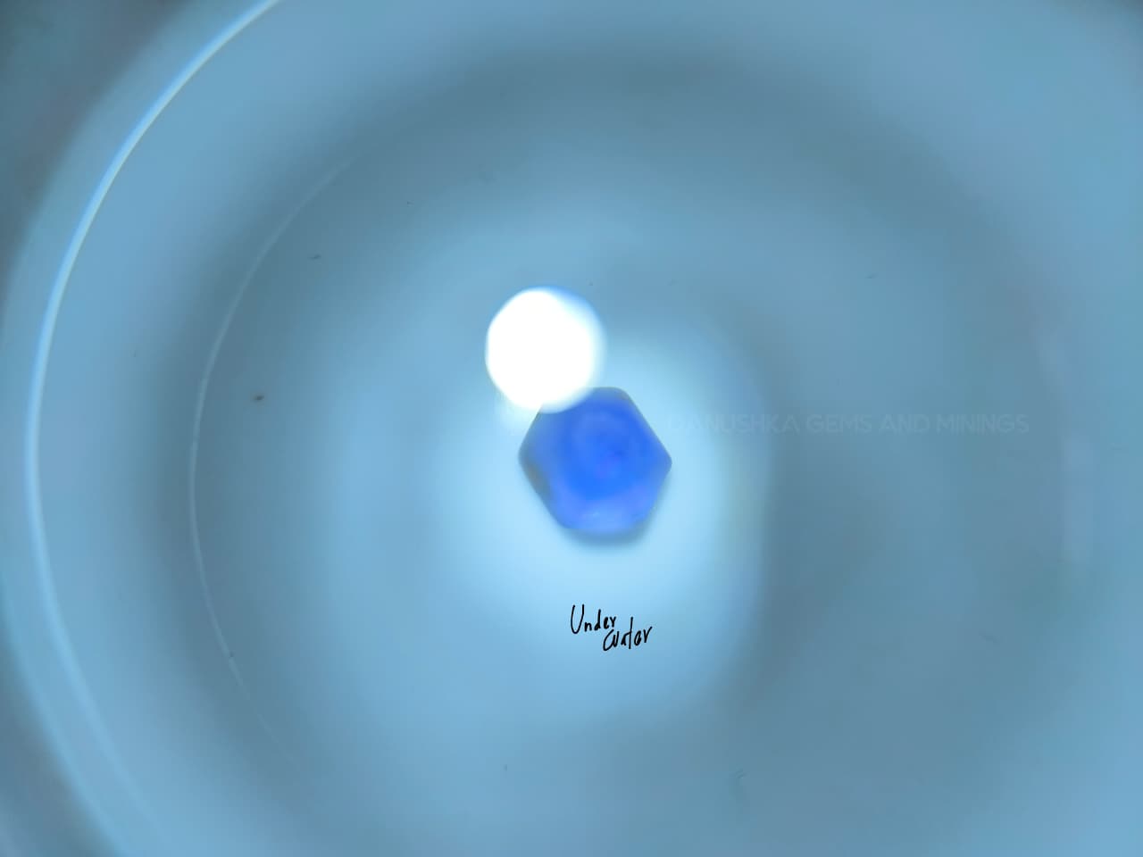 4.50 ct Ceylon Natural Unheated Blue Sapphire rough from Rakwana village around mining in Sri Lanka with visible internal features and cutting potential.