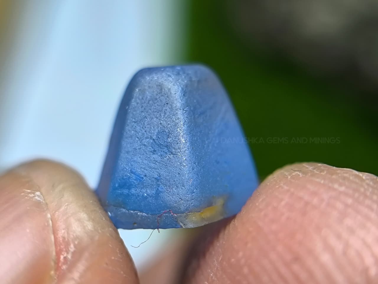 4.50 ct Ceylon Natural Unheated Blue Sapphire rough from Rakwana village around mining in Sri Lanka with visible internal features and cutting potential.