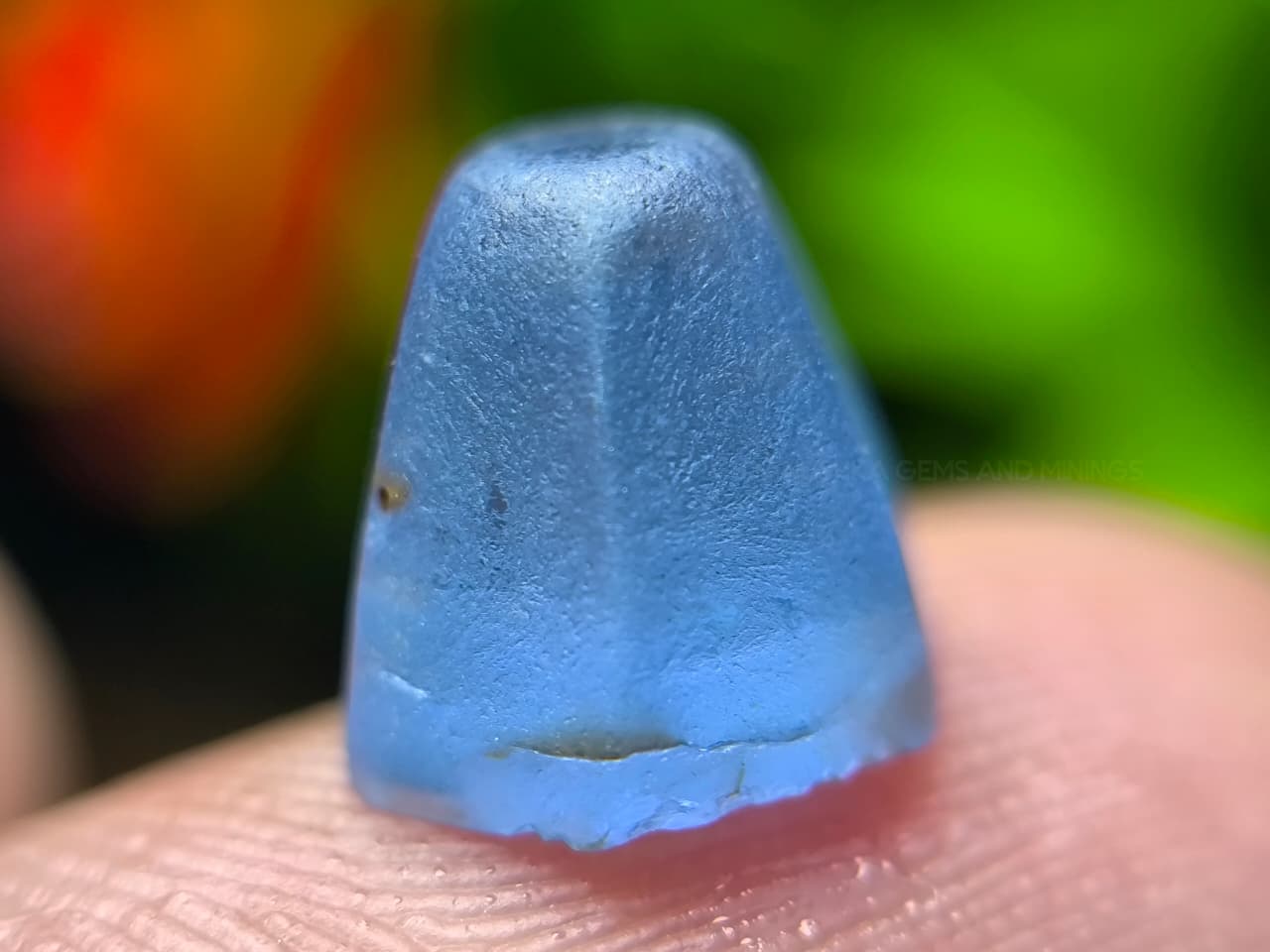 4.50 ct Ceylon Natural Unheated Blue Sapphire rough from Rakwana village around mining in Sri Lanka with visible internal features and cutting potential.