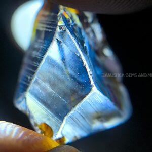 11.20 ct unheated Ceylon natural blue geuda sapphire rough from Kataragama village around mining in Sri Lanka with vitreous glassy body and crystal growth marks