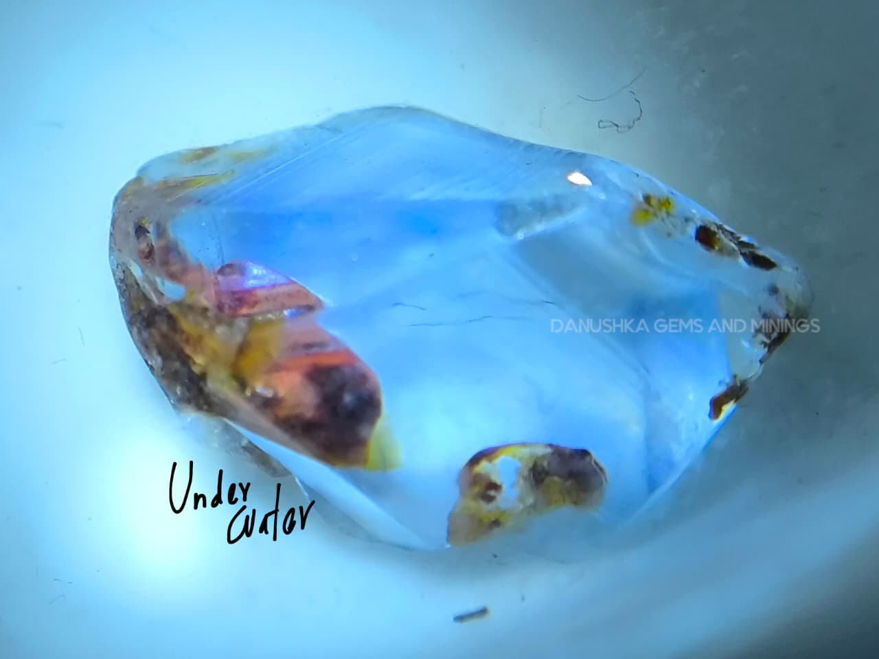 11.20 ct unheated Ceylon natural blue geuda sapphire rough from Kataragama village around mining in Sri Lanka with vitreous glassy body and crystal growth marks