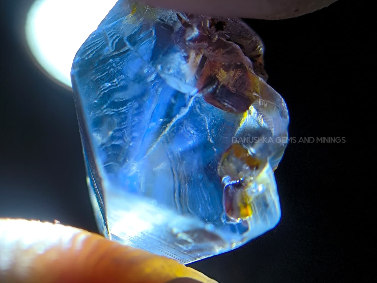 11.20 ct unheated Ceylon natural blue geuda sapphire rough from Kataragama village around mining in Sri Lanka with vitreous glassy body and crystal growth marks